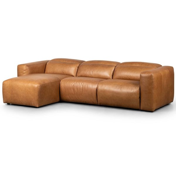 Sofa narozna o wyrazistej formie z subtelnym wyrazem w odcieniu bezu