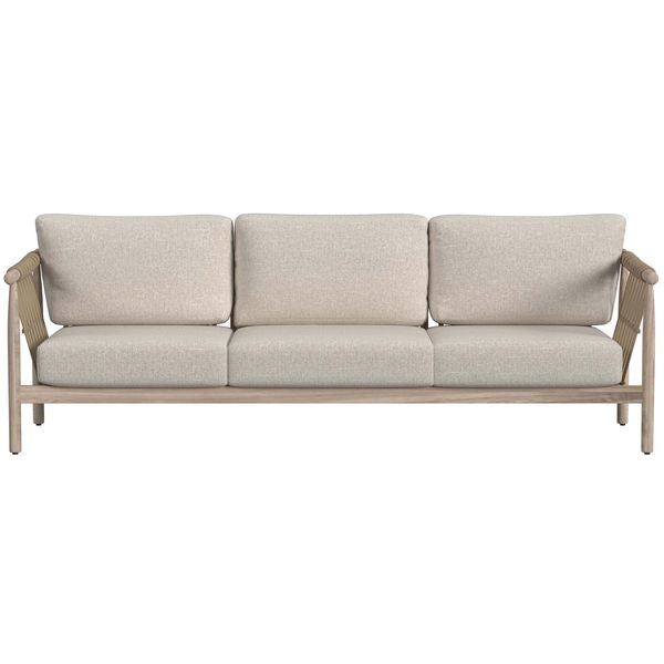 Sofa tapicerowana o harmonijnych proporcjach z oszczednym detalem w odcieniu bieli